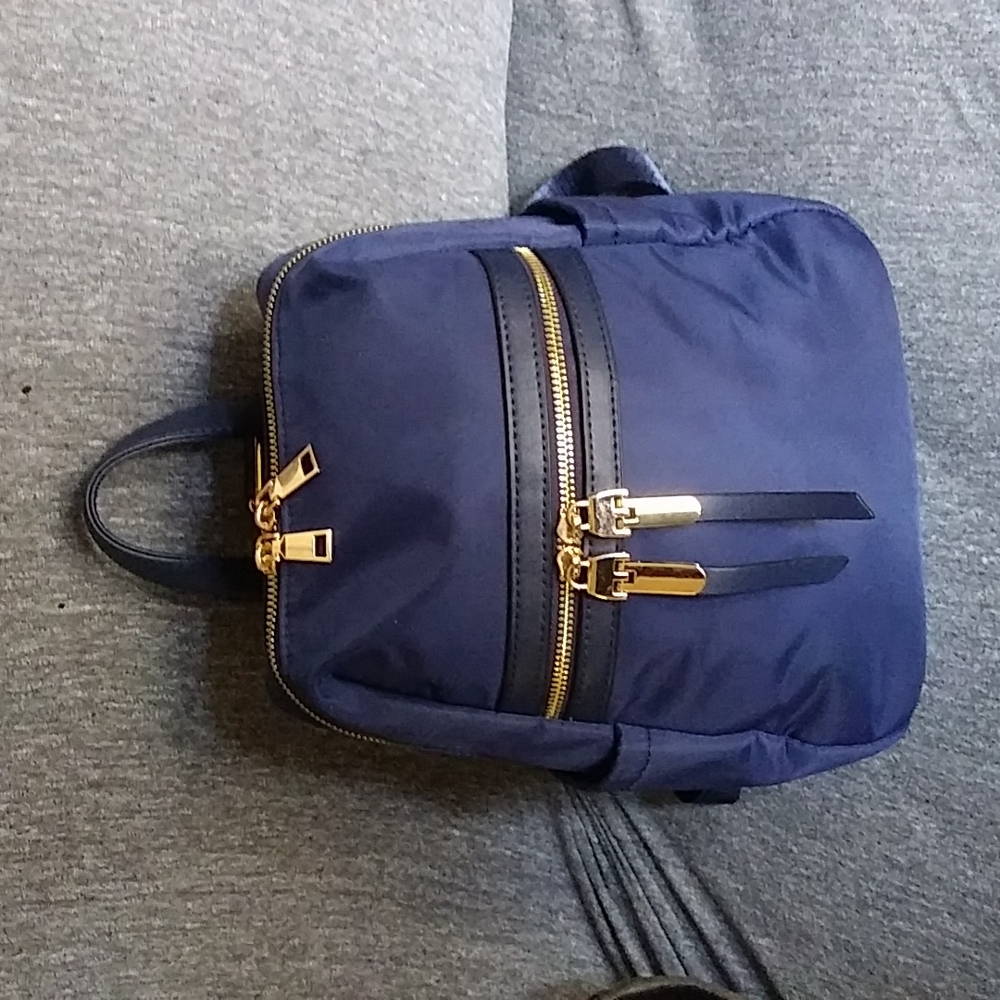 Blue Nylon mini backpack purse.